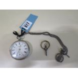 A silver Waltham pocket watch, 5.5cm case, with silver chain and a key, in running order, small