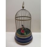 A 20th Century singing bird in a cage automaton, 33cm tall, in working order