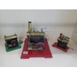 Two static steam engines by Mamod and another by signalling Equipment Ltd, largest 23cm x 26cm