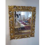 A good gilt wood acanthus scroll carved mirror, 85cm x 69cm