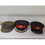 Three Royal Artillery officers peaked caps