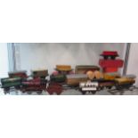 A collection of Hornby 0 gauge tinplate rolling stock and two engines, both running, some playwear