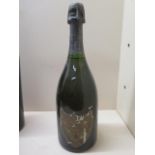 A 75cl bottle of Moet Chandon Cuvee Don Perignon vintage 1978 champagne, level below foil, cork