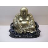 A large bronze seated Buddha on a carved hardwood base, 28cm tall x 35cm wide x 25cm deep, in
