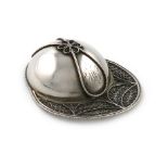 A George III novelty silver jockey cap caddy spoon, unmarked, with a filigree brim, and applied