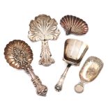 A collection of five antique silver caddy spoons, various dates and makers, including: a George