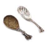 A Victorian cast silver caddy spoon, by George Adams, London 1865, gilded fig-shaped bowl with