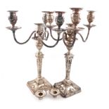 A pair of Victorian silver candlesticks with matching electroplated four-light branches, by Rupert