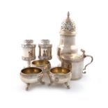 A mixed lot of silver items, comprising: a pair of George III muffineers, by Emes and Barnard,