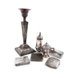 A mixed lot, comprising silver items: a single candlestick, London 1919, tapering square form,