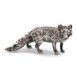 A silver model of a fox, by Grey and Co., Chester 1930, modelled in a standing position, length 11.