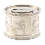 An American silver money box, by William Kerr and Co., Newark, New Jersey, circular drum form, the