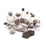 A mixed lot of silver items, comprising: a Victorian buckle, by Minshull & Latimer, Birmingham 1897,