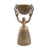A silver-gilt wager cup, by Birch & Gaydon, London 1936, modelled as a lady with a full skirt, and