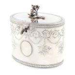 A George III silver tea caddy, by Aaron Lestourgeon, London 1772, oval form, engraved foliate