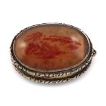 A 19th century silver-gilt and agate vinaigrette, unmarked, circa 1830, oval form, the cover with an