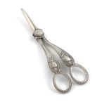 A pair of Victorian silver grape scissors, by Martin, Hall and Co, Sheffield 1888, with Feather-edge