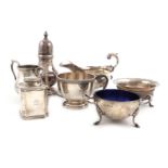 A mixed lot of silver items, various dates and makers, comprising: a late-Victorian sauce boat, by