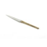 By Stuart Devlin, a modern parcel-gilt silver letter opener, London 1985, tapering form, with a