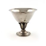 By Georg Jensen, a Danish silver comport, design No. 590, tapering circular form, spot-hammered