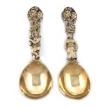 A pair of Victorian cast silver-gilt caddy spoons, by Francis Higgins, London 1862, oval bowls, cast