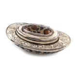 An 18th century silver-mounted shell snuff box, unmarked, oval form, the mounts with chased