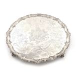 A George III silver salver, by Richard Rugg, London 1768, circular form, bead and scroll border, the