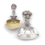 By Tiffany and Co., two American silver caddy/bonbon spoons, one with a flat shovel bowl, and