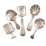 A collection of five antique silver caddy spoons, various dates and makers, including: a William