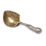 A Victorian silver Albert pattern caddy spoon, by George Adams, London 1843, cast shell bowl, gilded