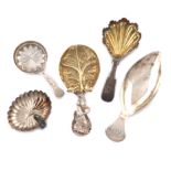 A collection of five antique silver caddy spoons, various dates and makers, including: a George