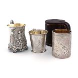 A small collection of three silver christening mugs, comprising: a Victorian one by Creswick &