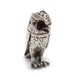 A modern novelty silver owl pepper, maker's mark of E and J, London 2001, modelled in a standing