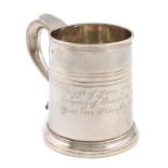 A George I silver mug, by Timothy Lee, London 1714, tapering circular form, scroll handle, reeded
