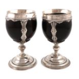 A pair of late 18th / early 19th century silver-mounted coconut cups, one with maker's mark BI