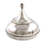 A 19th century Indian silver box, unmarked, circular form, raised cover with a pointed finial, the