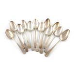 A collection of twelve silver Old English pattern tablespoons, various dates and makers, including