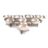 A matched set of eight two-handled metalware finger bowls, marked 0.900, circular form, pierced