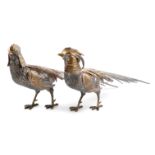 A pair of modern Spanish parcel-gilt silver pheasants, modelled in standing positions, textured