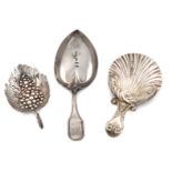 A small collection of three antique silver caddy spoons, comprising: one by Matthew Linwood,