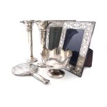 A mixed lot of silver items, comprising: a pair of trumpet vases, by Walker and Hall, Sheffield