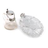An American silver-mounted glass spirit flask, by Gorham, 1879, oval form, hob-nail cut and engraved