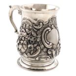 A George III silver mug, by William Grundy, London 1767, baluster form, later embossed foliate