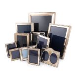 A collection of eleven silver photograph frames, various dates and makers, including: a large one of