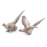 A pair of modern silver pheasants, by E. Barnard, London 1973, with textured feathers, lengths 24.