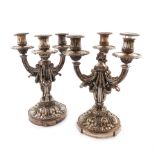 A pair of French electroplated candelabra, with three scroll arms with swags and foliate mounts,