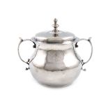 A Charles II silver two-handled porringer and cover, maker's mark probably that of Edward Gladwin,