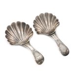 A George III silver Bright-cut caddy spoon, by Hester Bateman, London 1789, shell bowl, plain shield