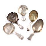 A collection of five antique silver caddy spoons, various dates and makers, including: a George