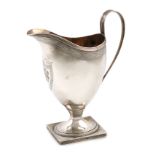 An early 19th century Dutch silver cream jug, possibly by J. A. Toorn, The Hague 1838, helmet